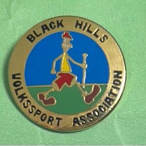 Black Hills Volksport Association brass logo pin